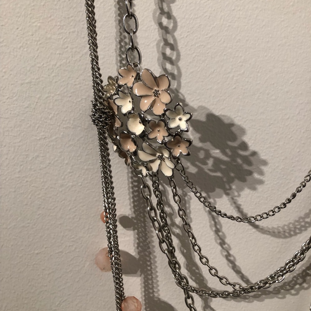 two / silver costume necklaces